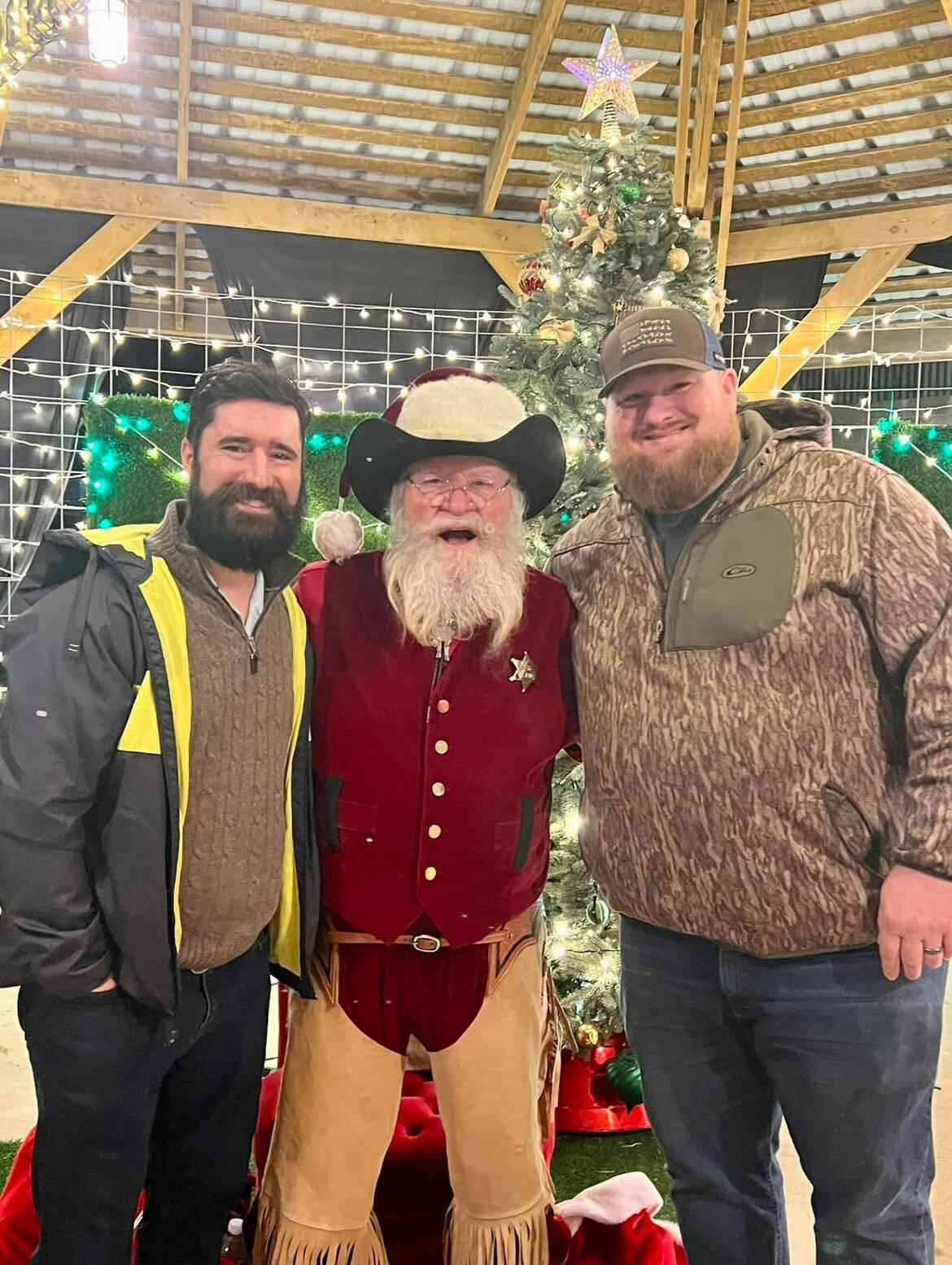 Brethren of Johnson City Lodge No. 561 with a Hill Country Santa at a Christmas-season lodge event.