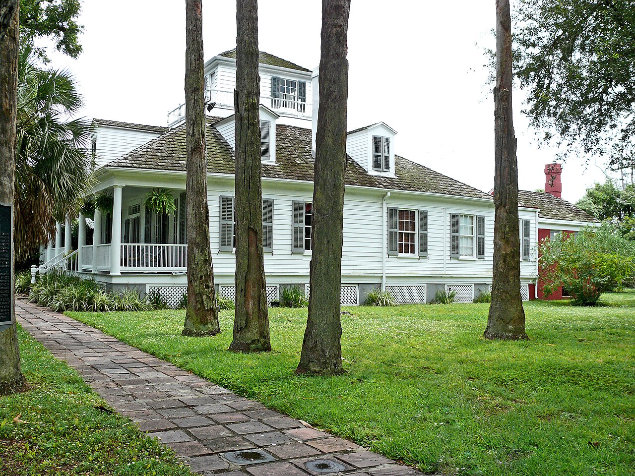 Samuel May Williams House in Galveston, Texas, a Greek Revival historic landmark elevated on brick piers.