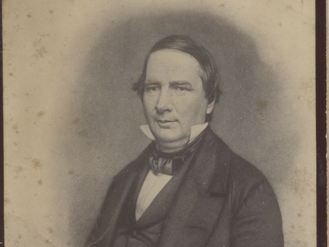 Lithograph portrait of Thomas J. Rusk, head and shoulders, in a dark coat, vest, and cravat, in a detail from a memorial print inscribed 'Hon. Thomas J. Rusk, Late Senator from Texas.'